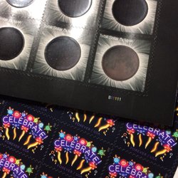 US Post Office - Thermoreactive solar stamps (sheet of 16) and neon celebrate stamps (sheet of 20)