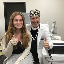 Katzen Eye Care & Laser Center - Dr. Luchs with a happy LASIK patient.