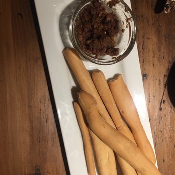Locanda Wine Bar - Breadsticks and olive tapenade - Italian Near Me - Livermore, California Locanda Wine Bar - Breadsticks and olive tapenade - Italian Near Me - Livermore, California