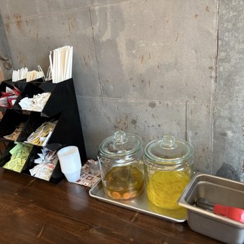 Station Six - Condiment counter with banana peppers. - Bakeries Near Me - Albany, New York Station Six - Condiment counter with banana peppers. - Bakeries Near Me - Albany, New York