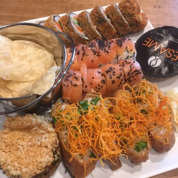 Sushi Shop - Top: Dragon Eye, Middle: Twin Salmon, Bottom: Inari, Left: Salmon Tartare with rice chips - Japanese Near Me - Cowansville, Quebec Sushi Shop - Top: Dragon Eye, Middle: Twin Salmon, Bottom: Inari, Left: Salmon Tartare with rice chips - Japanese Near Me - Cowansville, Quebec