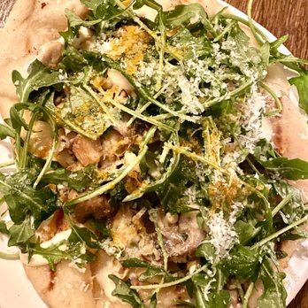 Estelle - Mushroom coca with Madeira, crème fraîche, Dijon, parsley, Parmesan, arugula, chili oil - Wine Bars Near Me - Saint Paul, Minnesota