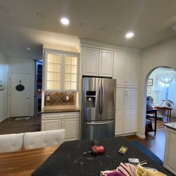LED under cabinet lighting, inside cabinet and indirect above.