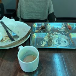 Tandoori Corner - Remnants of the most fabulous lunch: Butter Chicken, Tandoori Chicken, Lamb Curry, Garlic Naan, Chai, Rice Pudding. Absolutely delicious!!!