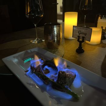 Candle in the Woods - Lamb pops with absinthe. (Absinthe makes the heart grow fonder!) - Wine Bars Near Me - Athol, Idaho