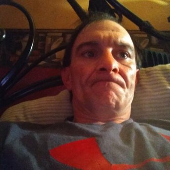 Tiger Diner - a man laying on a bed - American Near Me - Delhi, Louisiana Tiger Diner - a man laying on a bed - American Near Me - Delhi, Louisiana
