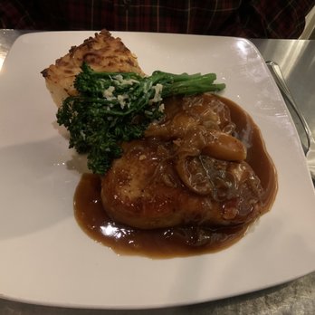 Butch's Dry Dock - Berkshire pork chop with potatoes and broccolini - New American Near Me - Holland, Michigan