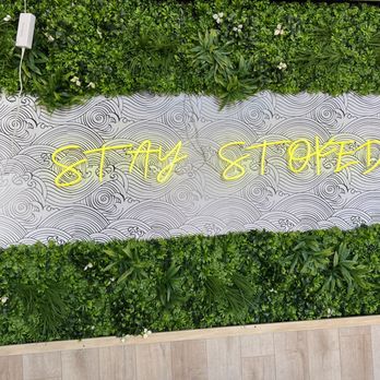 Stoked Poke - a sign in front of a green wall - Poke Near Me - Daytona Beach, Florida Stoked Poke - a sign in front of a green wall - Poke Near Me - Daytona Beach, Florida