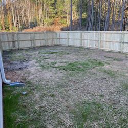 Number Juan Fencing - This is the day after Juan finished. Our house was new and it was raining a bit before so the ground looks rough. Regardless Juan killed it!