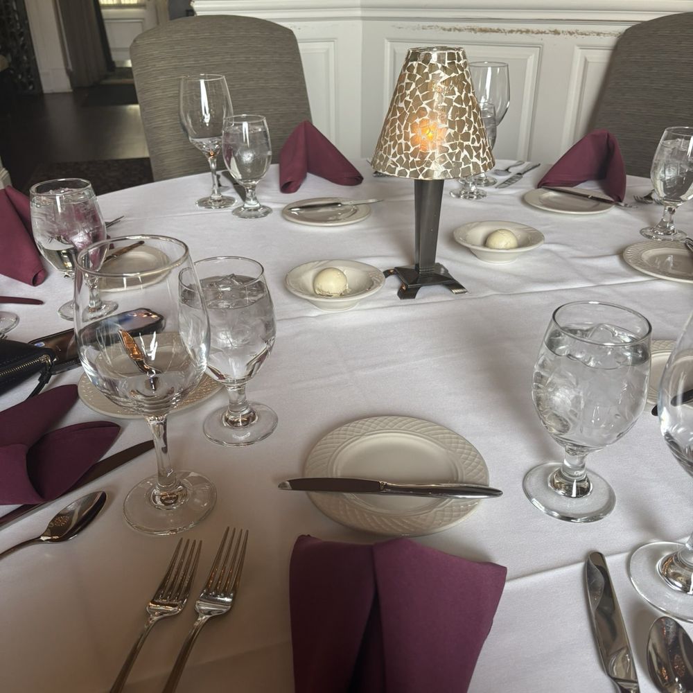 Laury's Restaurant - Table setting - Steakhouses Near Me - Charleston, West Virginia Laury's Restaurant - Table setting - Steakhouses Near Me - Charleston, West Virginia