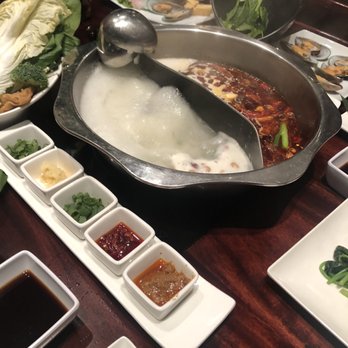 Q Restaurant - Black chicken bone broth and mala broth. - Chinese Near Me - Boston, Massachusetts Q Restaurant - Black chicken bone broth and mala broth. - Chinese Near Me - Boston, Massachusetts