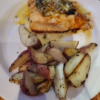 Real Seafood Company Ann Arbor - Crab stuffed salmon with beur blanc sauce. Stuffing also has shrimp and mushrooms. Very tasty! Sidebar of roasted red potatoes. - Seafood Near Me - Ann Arbor, Michigan Real Seafood Company Ann Arbor - Crab stuffed salmon with beur blanc sauce. Stuffing also has shrimp and mushrooms. Very tasty! Sidebar of roasted red potatoes. - Seafood Near Me - Ann Arbor, Michigan