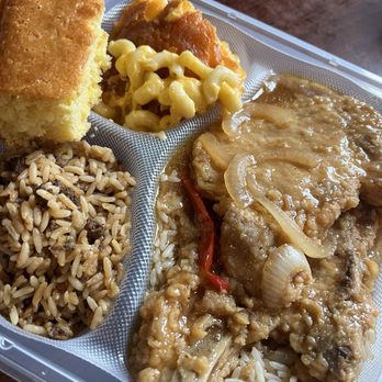 Li'l Dizzy's Cafe - Smothered pork chops plus 2 sides - Cajun/Creole Near Me - New Orleans, Louisiana Li'l Dizzy's Cafe - Smothered pork chops plus 2 sides - Cajun/Creole Near Me - New Orleans, Louisiana