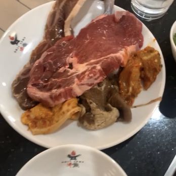 Boil Spot - My plate of delicious meats (notice the huge ribeye on top!) - Hot Pot Near Me - Orlando, Florida