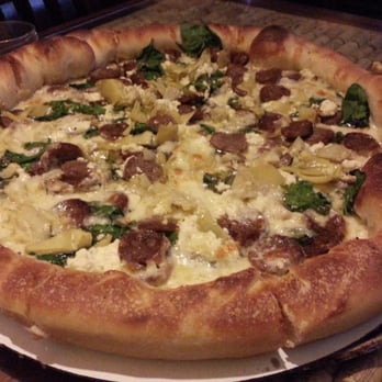 Domenics - White Lightning pizza (16") with added Italian sausage, spinach and artichoke hearts. HEAVENLY. - New American Near Me - Fort Collins, Colorado