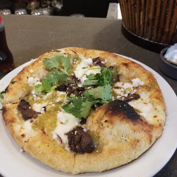 Industrial Eats - Skirt steak pizza $15 (w already eaten oyster-uni-acacafo appetizers in the background) - Pizza Near Me - Buellton, California Industrial Eats - Skirt steak pizza $15 (w already eaten oyster-uni-acacafo appetizers in the background) - Pizza Near Me - Buellton, California