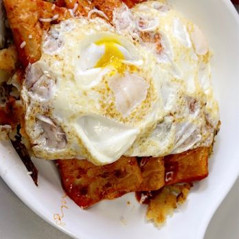 Cherry Pit Cafe - Enchilada skillet with over easy eggs - American Near Me - Deerfield, Illinois Cherry Pit Cafe - Enchilada skillet with over easy eggs - American Near Me - Deerfield, Illinois