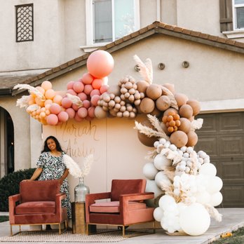 The Balloon Babe Modesto - Owner of the balloon babe standing in front of her creation - Balloon Services Near Me The Balloon Babe Modesto - Owner of the balloon babe standing in front of her creation - Balloon Services Near Me