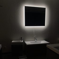 Concept Baths and Interiors - LED mirror in the dark.
