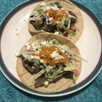 Cuisines by Sammy - 2 steak tacos topped with cilantro and onion with salsa verde - Food Delivery Services Near Me - Chicago, Illinois