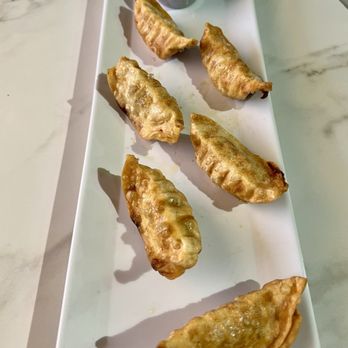 Pho L'amour - A9. Pork Dumplings (Fried) - Vietnamese Near Me - Shreveport, Louisiana Pho L'amour - A9. Pork Dumplings (Fried) - Vietnamese Near Me - Shreveport, Louisiana