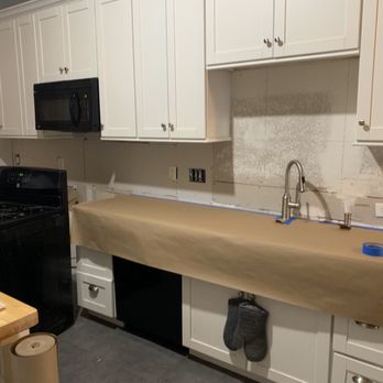 Home Renovation Services - Preparing to install new glass backsplash - Flooring Near Me Home Renovation Services - Preparing to install new glass backsplash - Flooring Near Me