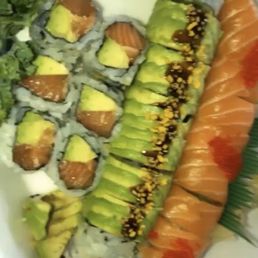 Green dragon roll, red dragon roll, salmon avocado maki roll. Green dragon roll, red dragon roll, salmon avocado maki roll.
