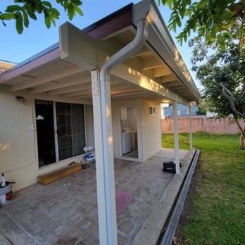 S & M Service - the back of a house with a covered patio - General Contractors Near Me S & M Service - the back of a house with a covered patio - General Contractors Near Me