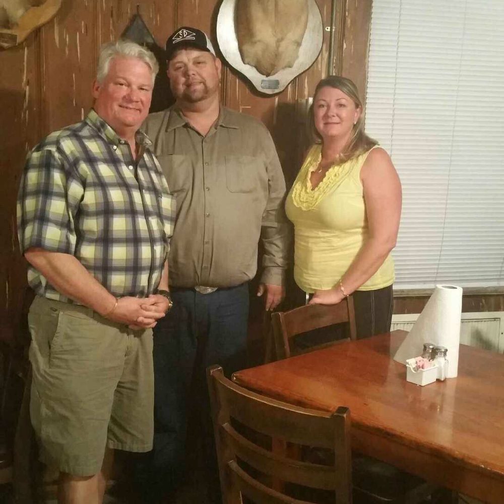 Cypress Inn Restaurant - Owner Mr. Danny with my husband and I and the fantastic deer - Southern Near Me - Cross City, Florida