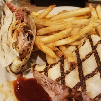 Puckett's Restaurant - Redneck Burrito. Filled with delicious pulled pork, baked beans and coleslaw. Delicious! - Southern Near Me - Pigeon Forge, Tennessee Puckett's Restaurant - Redneck Burrito. Filled with delicious pulled pork, baked beans and coleslaw. Delicious! - Southern Near Me - Pigeon Forge, Tennessee