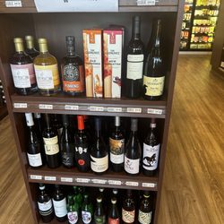 Tilted Bottles Wine, Beer & More