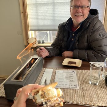 Cork & Board - Roasting marshmallows for delicious s'mores. - Wine Bars Near Me - Pagosa Springs, Colorado Cork & Board - Roasting marshmallows for delicious s'mores. - Wine Bars Near Me - Pagosa Springs, Colorado