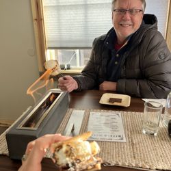 Cork & Board - Roasting marshmallows for delicious s'mores.