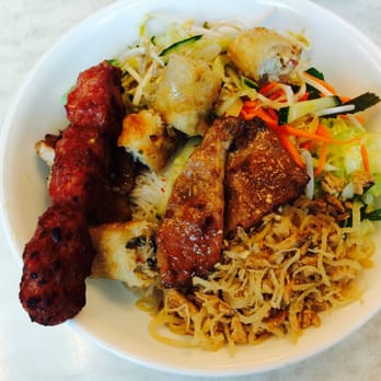 Try It Out Restaurant - Rice vermicelli combo (pork sausage, crispy spring rolls, pork chop, and shredded pork (bi) - Vietnamese Near Me - Auckland, AUK Try It Out Restaurant - Rice vermicelli combo (pork sausage, crispy spring rolls, pork chop, and shredded pork (bi) - Vietnamese Near Me - Auckland, AUK