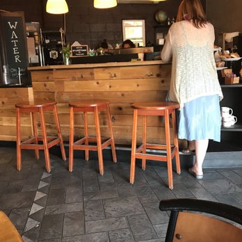 Tiny's Coffee - a woman standing at a counter - Coffee & Tea Near Me - Portland, Oregon Tiny's Coffee - a woman standing at a counter - Coffee & Tea Near Me - Portland, Oregon