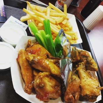 VooDoo Wing - 12 piece combo half Lemon Pepper half Sweet Heat - Chicken Wings Near Me - Las Vegas, Nevada VooDoo Wing - 12 piece combo half Lemon Pepper half Sweet Heat - Chicken Wings Near Me - Las Vegas, Nevada