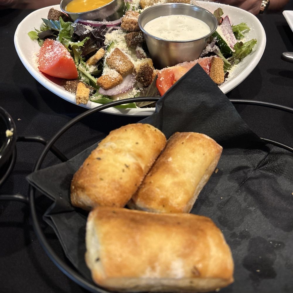 Matera Grill - Courtesy bread & house salad is easily enough for two. Heard good things. So far it's 5-star - Italian Near Me - Escanaba, Michigan Matera Grill - Courtesy bread & house salad is easily enough for two. Heard good things. So far it's 5-star - Italian Near Me - Escanaba, Michigan