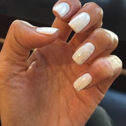 love my NYE shellac manicure with a little extra glitter :D!