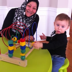 Sunshine Child Home Daycare - Mama Ezzat with one of her kids in the Sun Shine Home Day Care