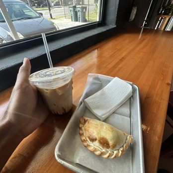 Cafe Nena'i - I ordered an iced mocha and a spinach empanada - Coffee & Tea Near Me - Austin, Texas