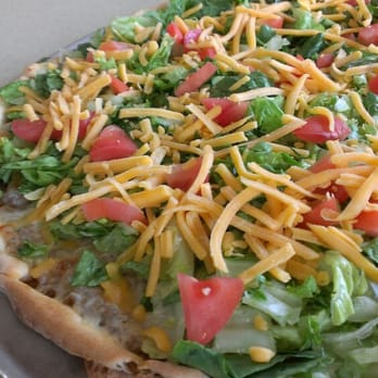 George's Vineyard - a pizza with cheese and lettuce - Pizza Near Me - Northfield, Minnesota