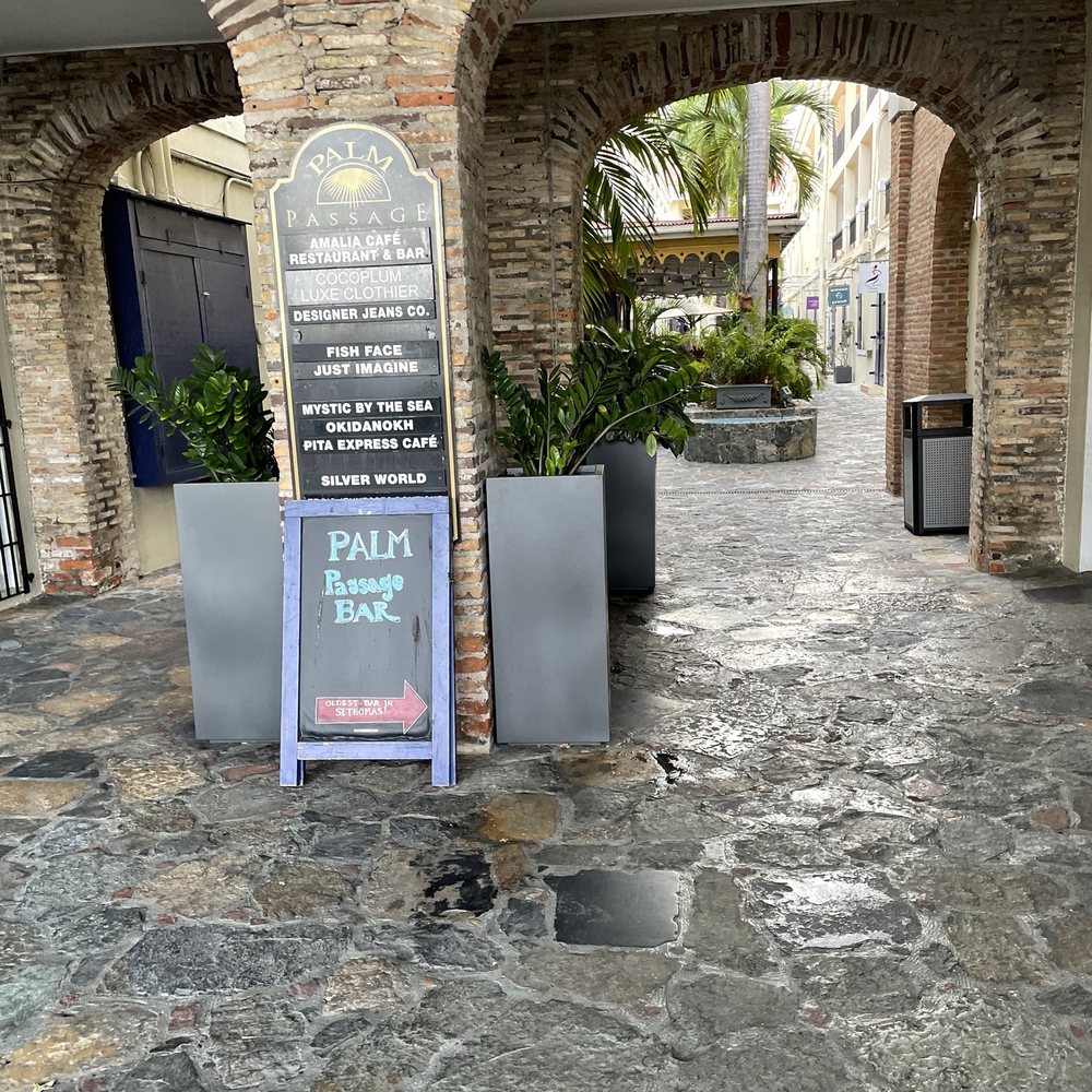 Amalia Cafe - Entrance to the alley - Spanish Near Me - St Thomas, Virgin Islands Amalia Cafe - Entrance to the alley - Spanish Near Me - St Thomas, Virgin Islands