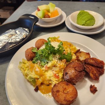 Phoebe's Diner - Migas with side of fruit and side of avocado - Diners Near Me - Austin, Texas
