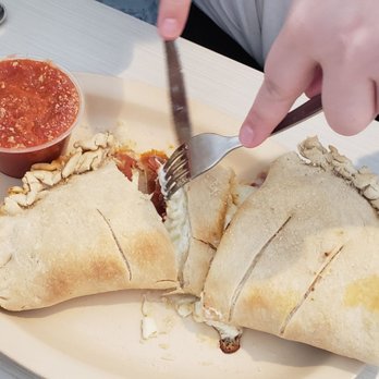 Memphis Pizza Cafe - a burrito cut in half - Pizza Near Me - Memphis, Tennessee