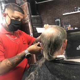 I should have asked the barber to leave this hair style for Uncle Tony :))