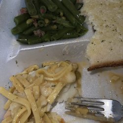 Official Time-Out - Chicken noodles mashed potatoes green beans and bread with butter.