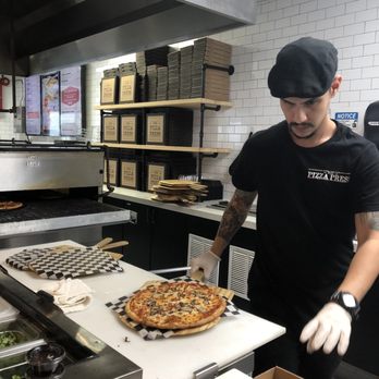 The Pizza Press - Celebration - Pizza Near Me - Kissimmee, Florida The Pizza Press - Celebration - Pizza Near Me - Kissimmee, Florida