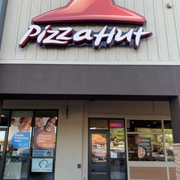 Entrance, sits on a strip center. Entrance, sits on a strip center.
