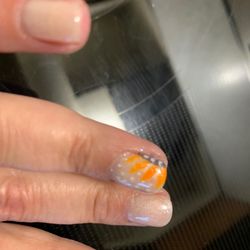 Mani Pedi Spa - This is the "free" nail design on both ring fingers.