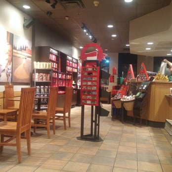 Starbucks - Dining area w/Eric working in the background - Coffee & Tea Near Me - Merrillville, Indiana